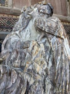 Hand Carved Petrified Wood - Peacock Atop Grape Vine - Image 3
