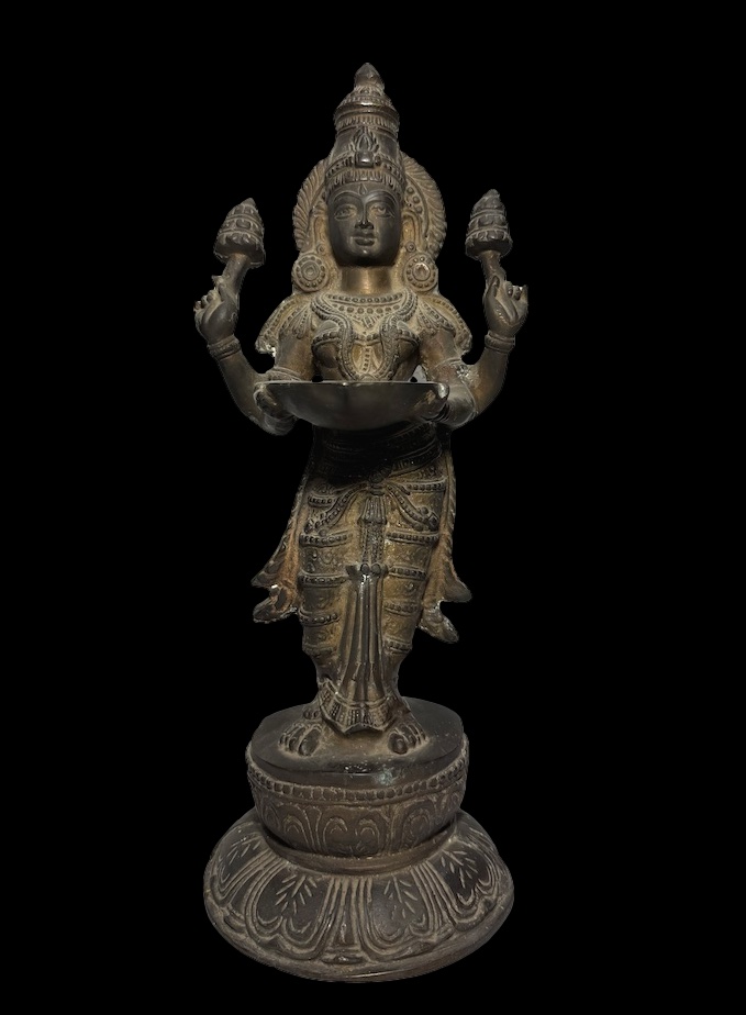 Old Brass Lakshmi Stands Atop Lotus Base